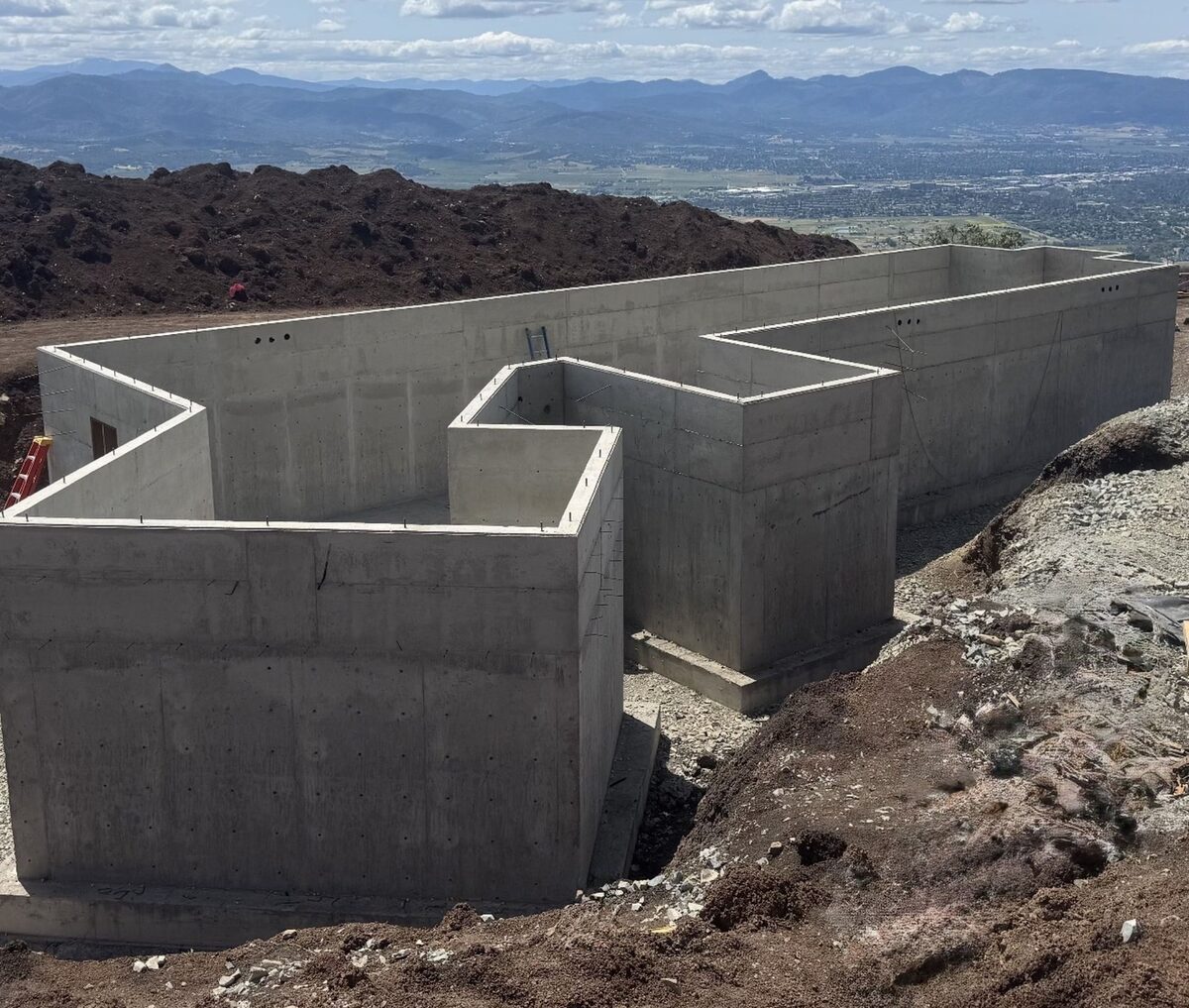 Poured concrete basement foundation walls overlooking the Rogue Valley
